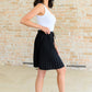 Just a Flirt Pleated Skirt in Black