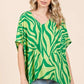 Women's oversized animal print top