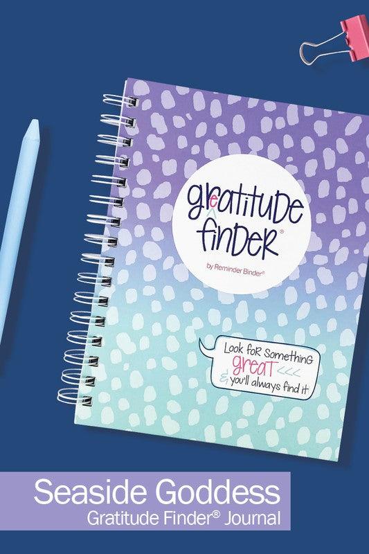 The front cover of a gratitude finder journal. 