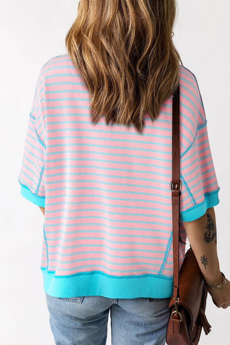 Back of pink and blue striped shirt with half sleeve